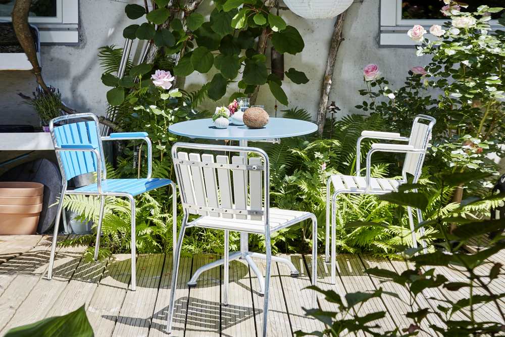 Gelber Haefeli Gartentisch Ø 90 cm von Embru, runder Outdoor Tisch für Garten und Terrasse.