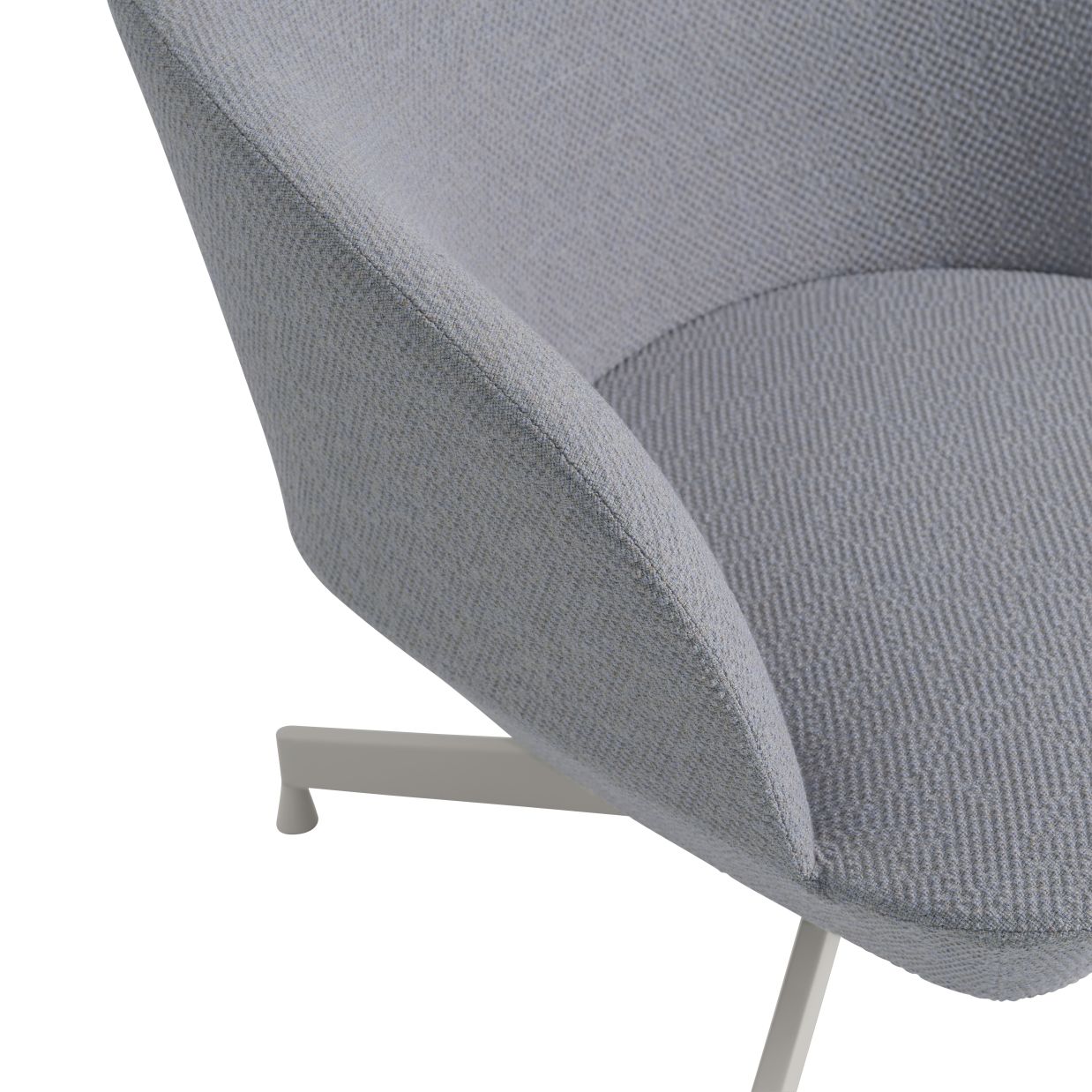 Detailaufnahme vom grauen Oslo Lounge Sessel von Muuto mit Stoffbezug und weißem Fußgestell.