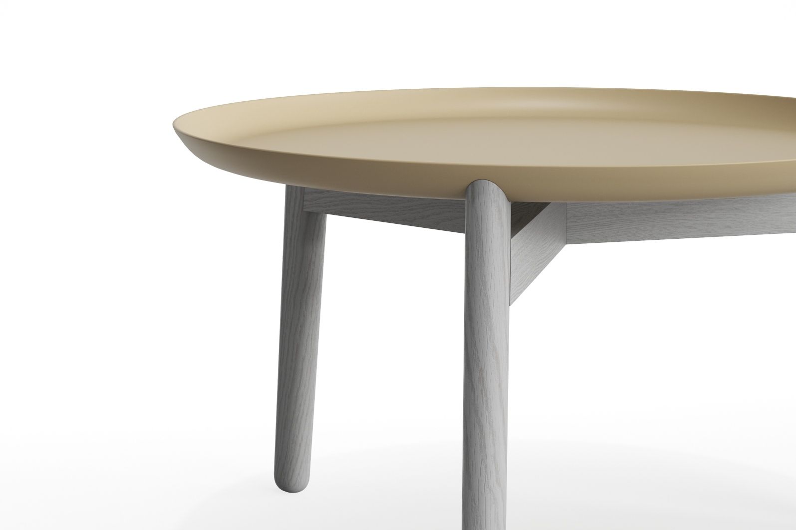 Detailaufnahme des Plaisir 2 Beistelltisches von Zeitraum, ein runder, niedriger Tisch mit Aluminiumplatte in Beige und hellgrauem Holzgestell.