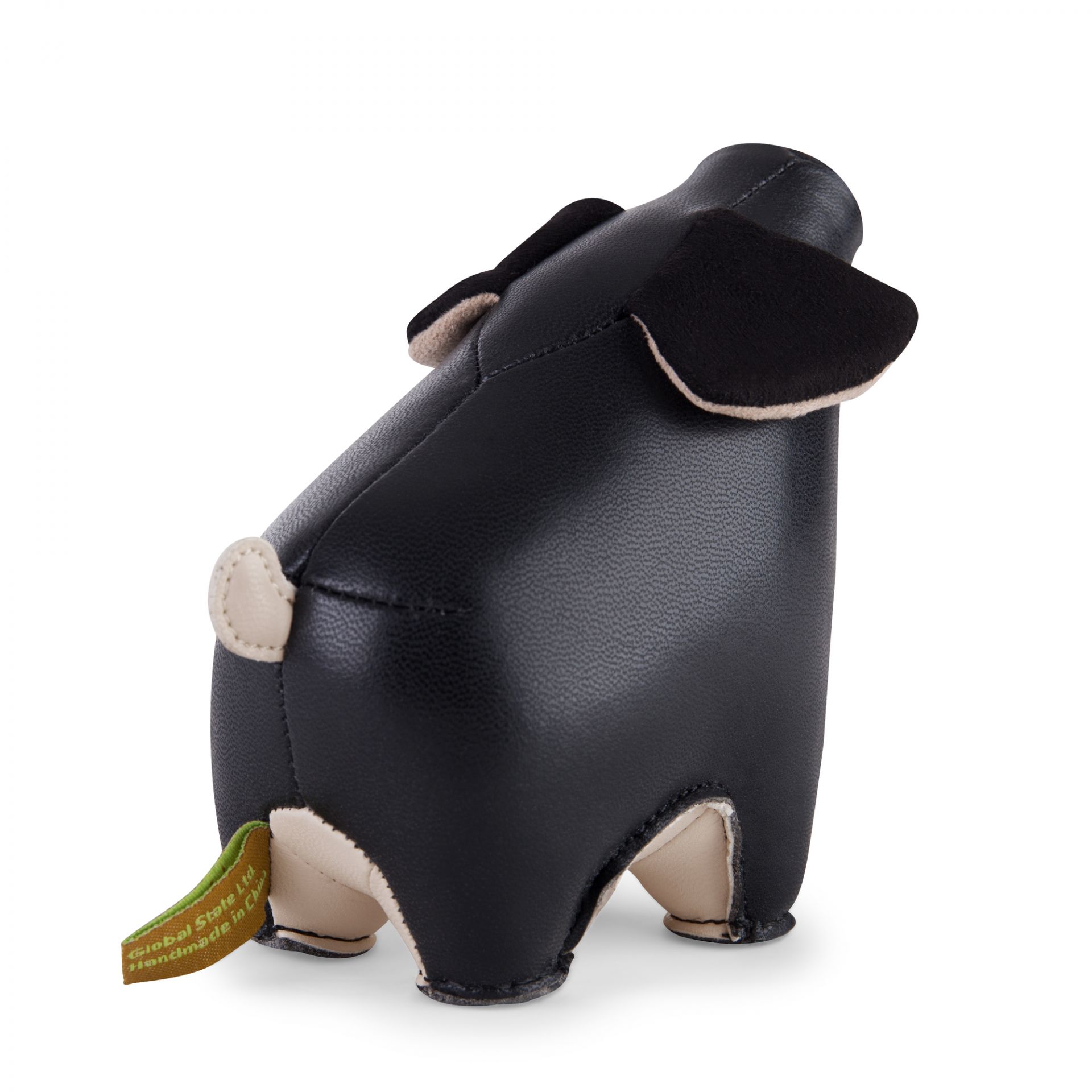 Ansicht des schwarzen Züny Schwein Briefbeschwerers. Dekoratives Accessoire für Schreibtisch und Büro.