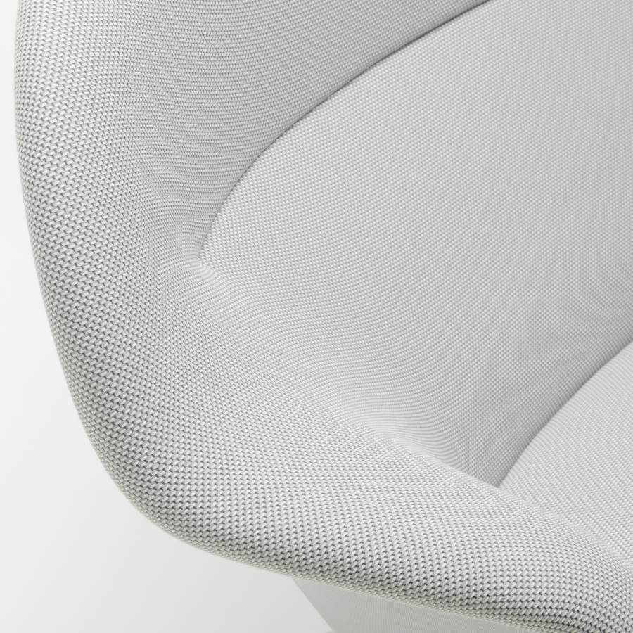 Detailaufnahme des hellgrauen Abalon Sofas von Vitra, Fokus auf die feine Stoffstruktur und Polsterung.