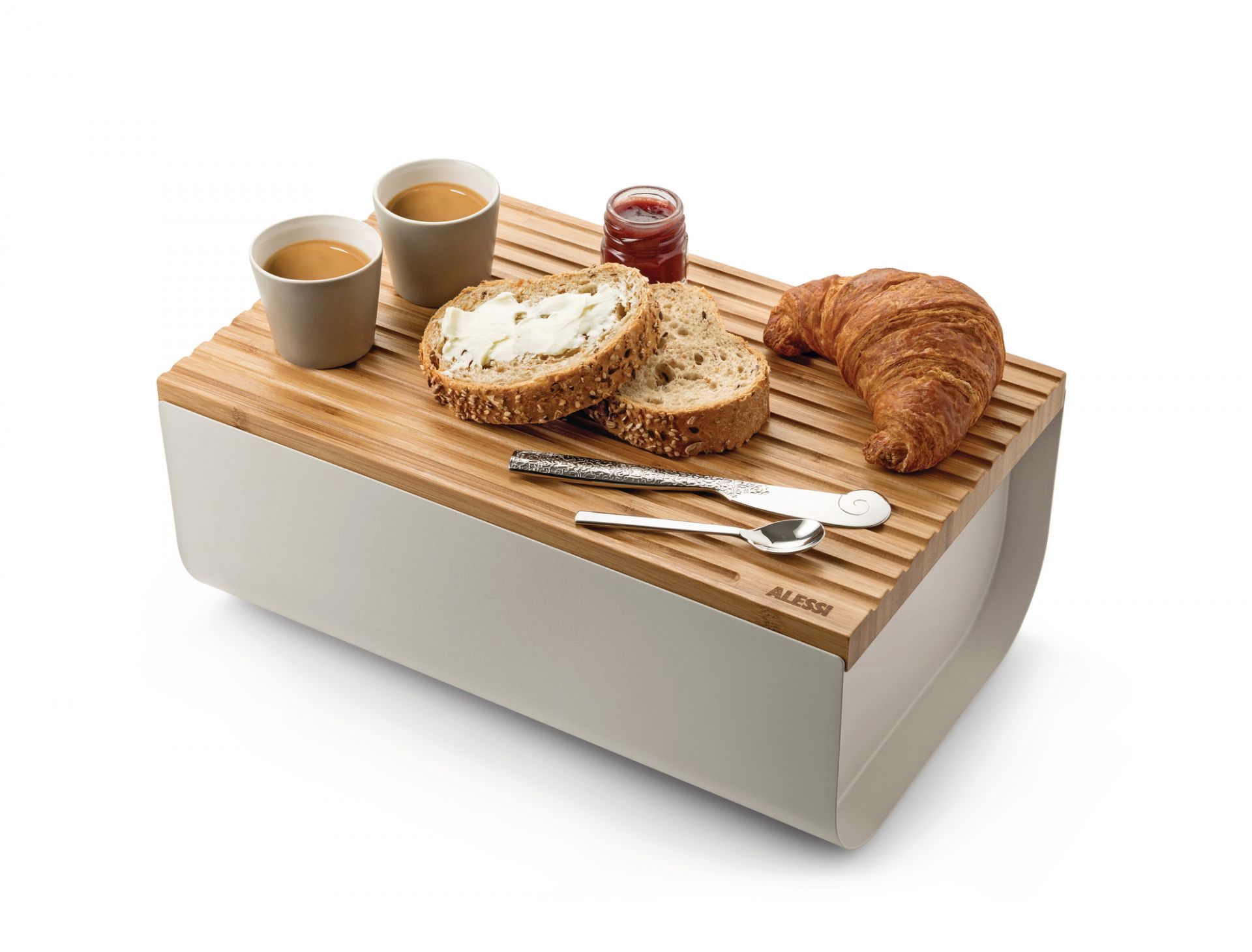 Mattina Brotkasten von Alessi aus Stahl mit Frühstücksgedeckt, inklusive Brot, Croissant, Marmelade und Kaffee.