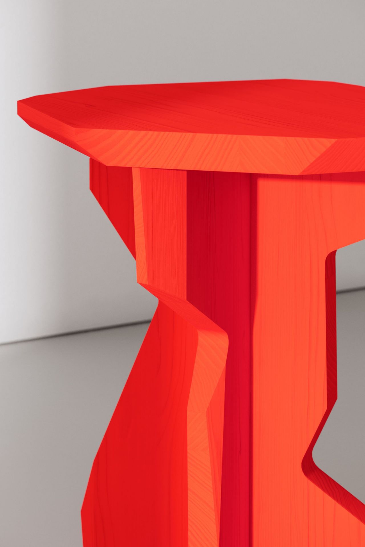 Detailaufnahme des FELS Hocker Esche Out in leuchtendem Rot, modernes Design Möbelstück für den Innenbereich.
