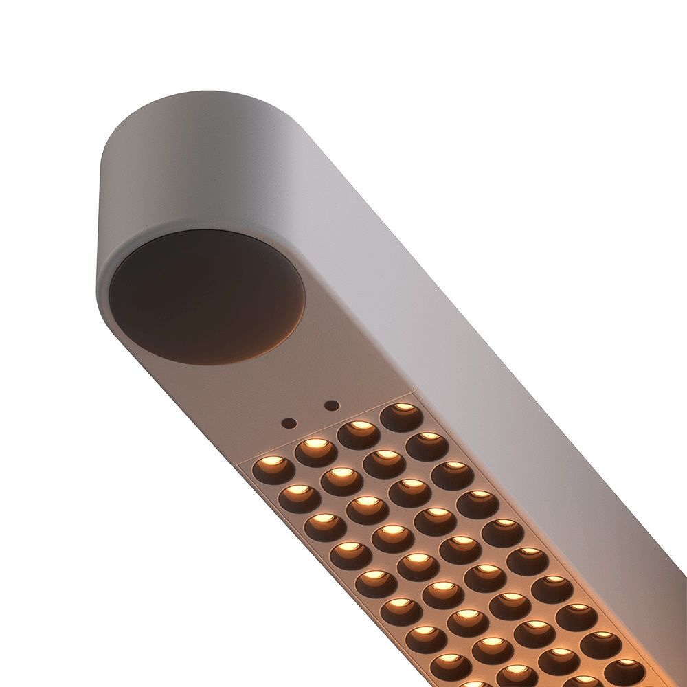 Detailaufnahme der grauen Team Mini LED Tischleuchte mit warmweißem Licht und modernem Design.