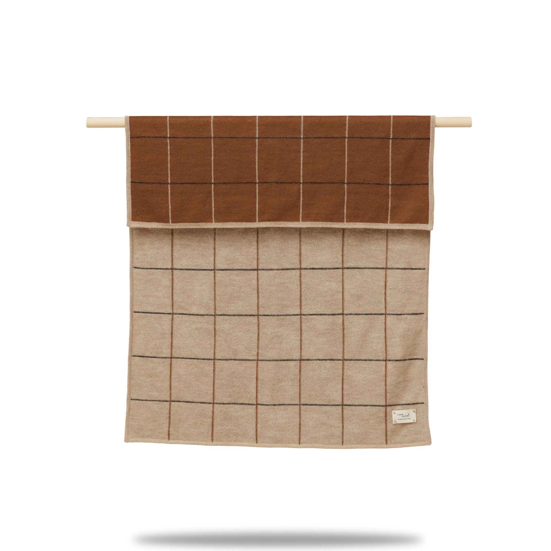 Aymara Kinderplaid New Squares, braun-beige kariert, hängend. Kuscheldecke für Kinderzimmer, Babydecke aus weicher Wolle.